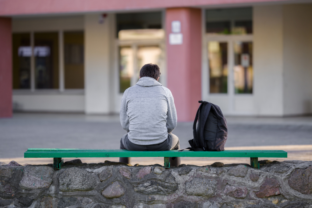 back view student on bench